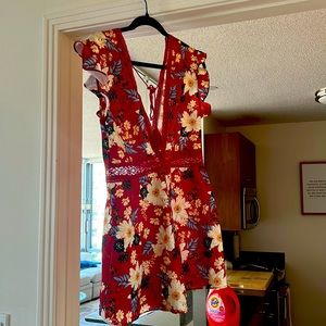 Cider red romper. Brand new. Never worn. Size large.